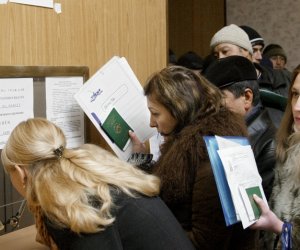 Предлагается упростить порядок принятия на жительство иностранцев в Литве